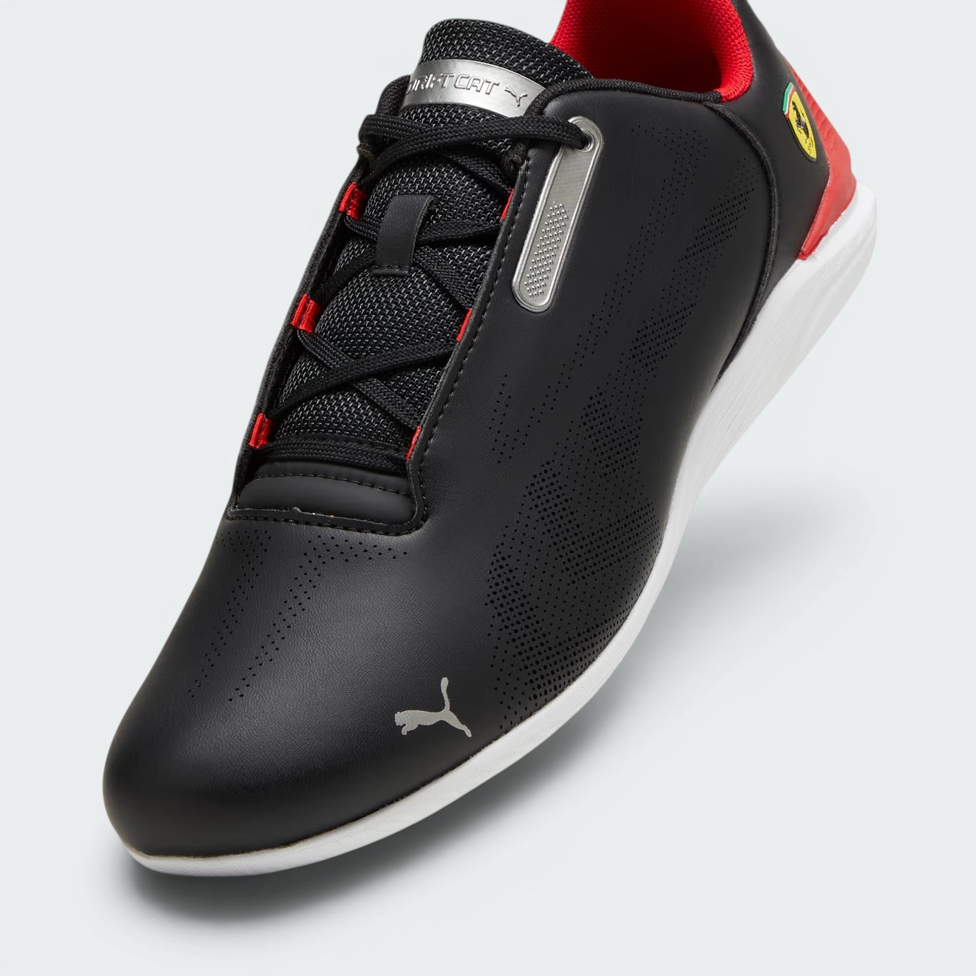 Highlights the technical low-profile sole and the "unreal" finish of the PUMA Cat logo.