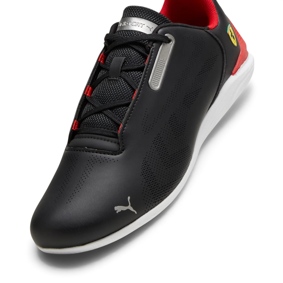 Highlights the technical low-profile sole and the "unreal" finish of the PUMA Cat logo.
