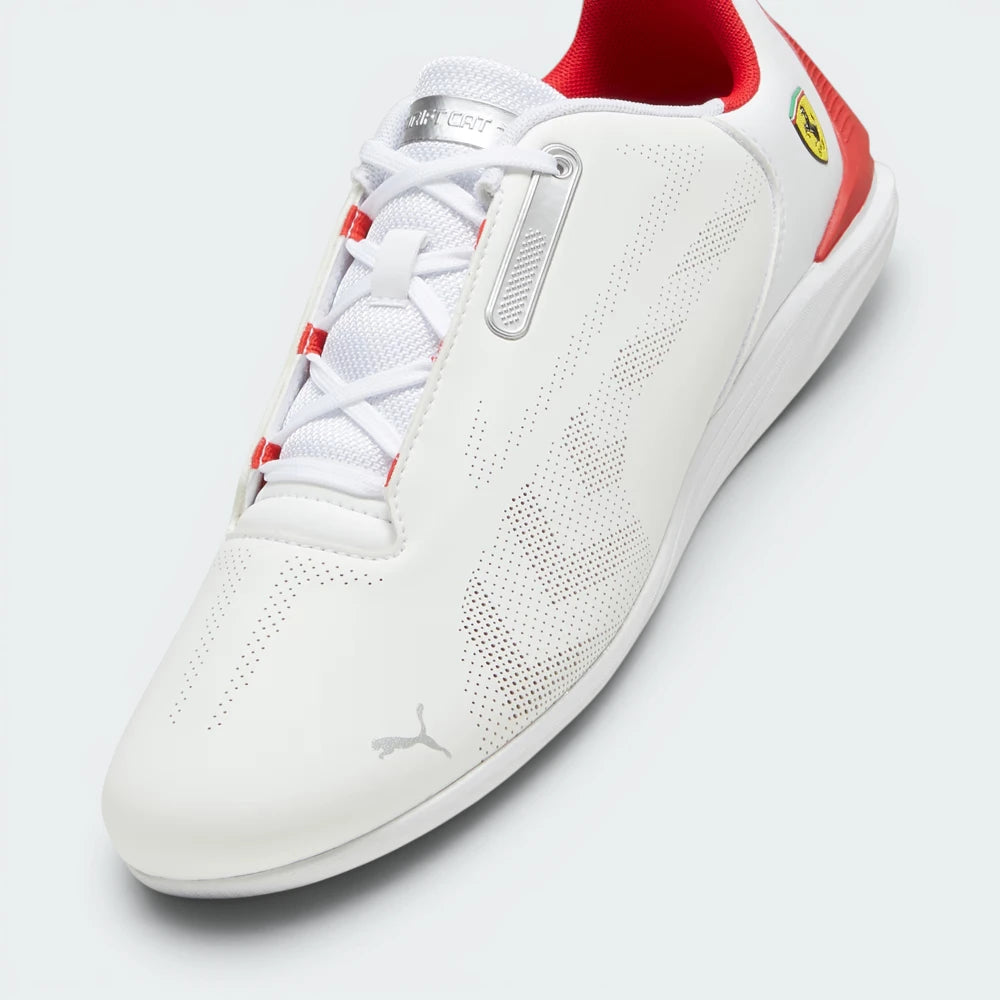 Details the micro-perforations shielding the forefoot panels and the precision of the asymmetrical lace layout stitching.