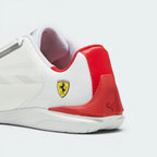 Focuses on the rounded driver's heel wrap architecture and the clean finish of the signature metal cat logo badge.