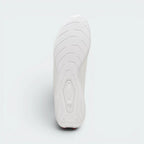 Displays the technical tire-tread rubber pattern of the low-profile outsole, engineered for unreal pedal grip and driving control.