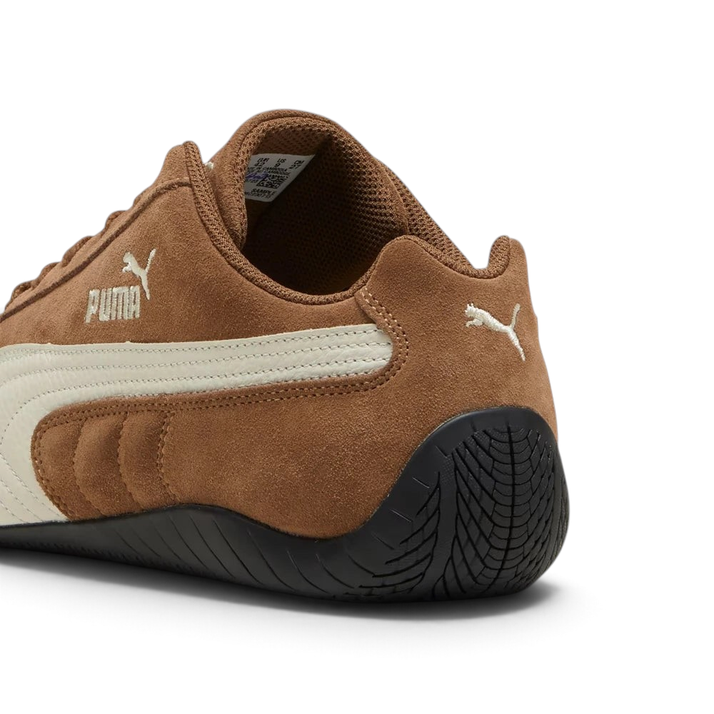 Focuses on the PUMA Cat leather heel window and the professional finish of the nubuck overlays.
