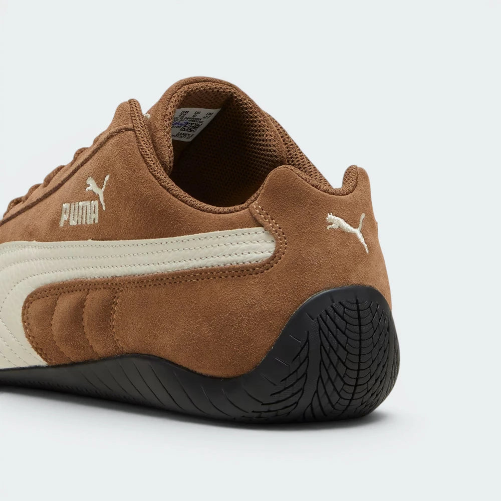 Focuses on the PUMA Cat leather heel window and the professional finish of the nubuck overlays.