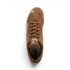 Focuses on the locked-in lacing system and the professional finish of the perforated vamp.