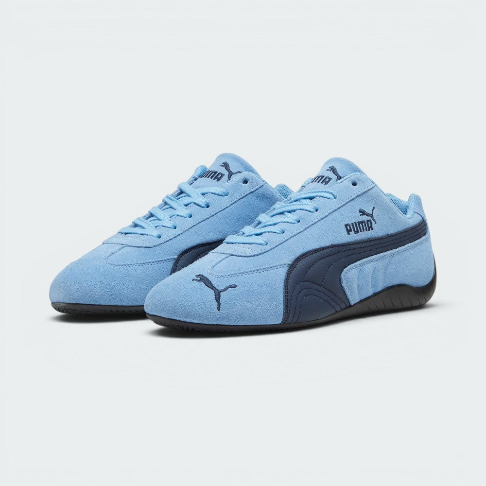 Emphasising the locked-in slim silhouette and the professional "Light Blue" colour depth.