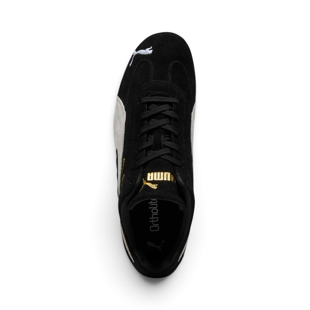 Focuses on the locked-in traditional lacing layout, displaying the clean symmetry of the black suede tongue, the gold foil Puma logo, and the breathable black OrthoLite® footbed inside.