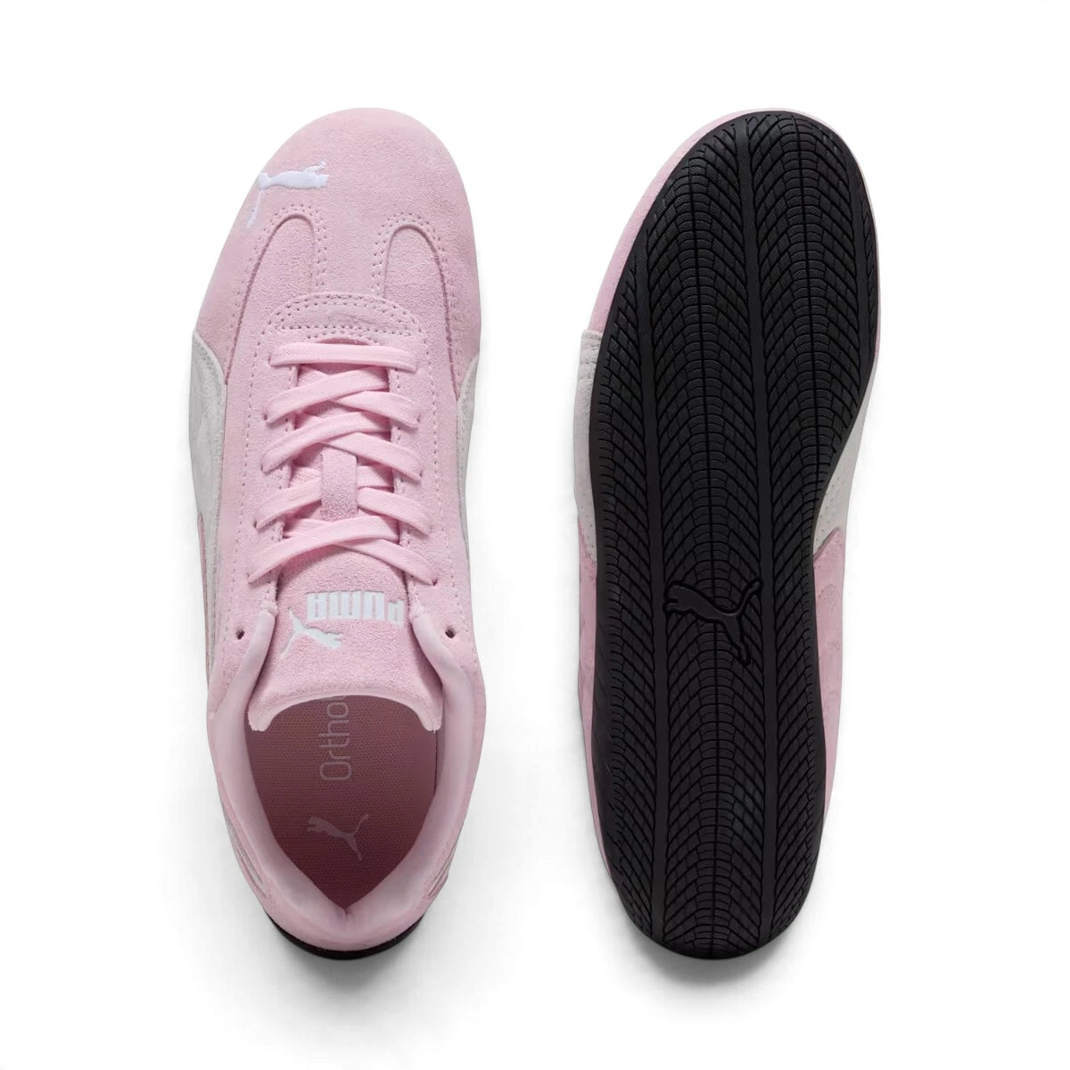 Top-down view of both shoes displaying the symmetric lacing system, padded tongues with PUMA branding, and OrthoLite insoles next to the bottom profile of the rubber tyre outsole.