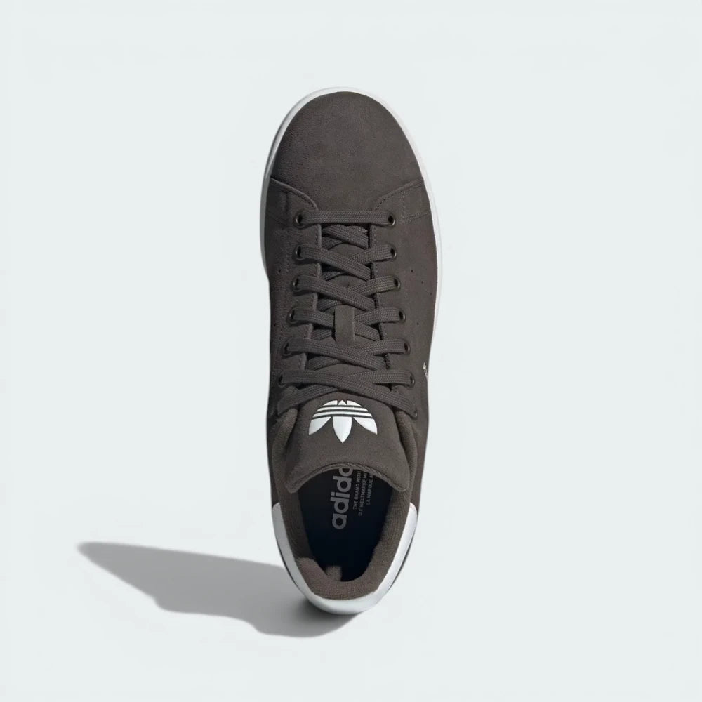 Top-Down View of Pair: Looking down at the suede lacing system and the iconic Stan Smith branding on the tongue.
