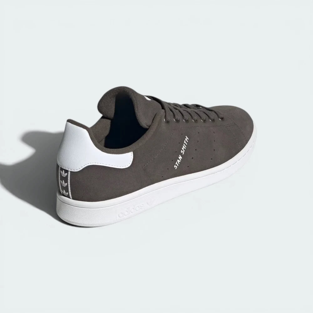 View from Behind Looking at the Heel: Focusing on the Cloud White heel tab and the debossed Adidas Trefoil logo.