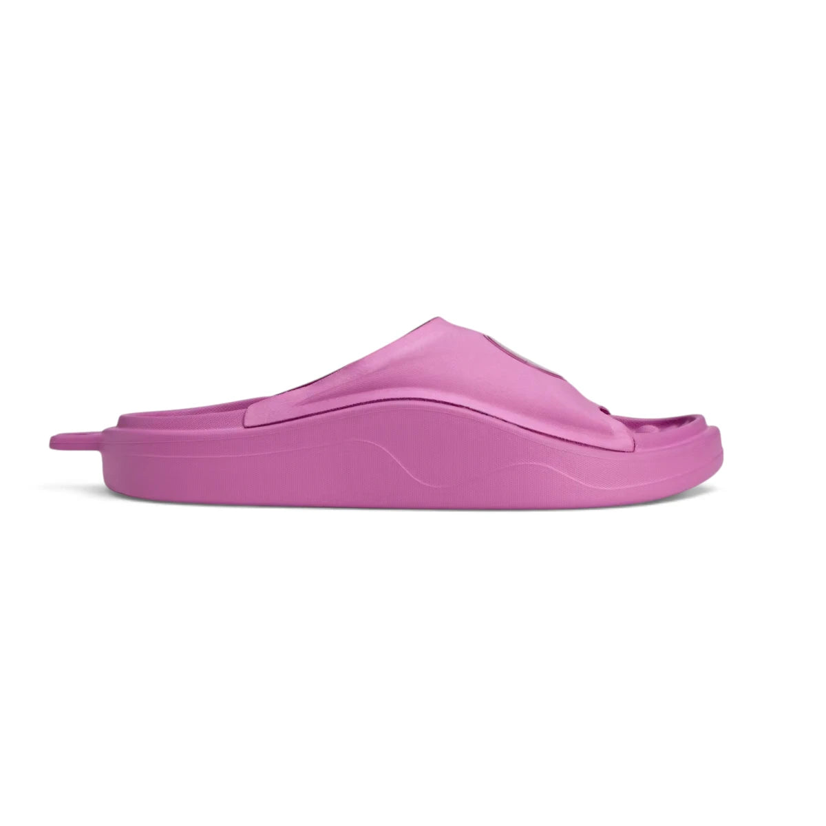 Studio side-profile shot of the adidas by Stella McCartney slides in Semi Pulse Lilac, highlighting the contoured one-piece EVA platform, sleek upper arch, and heel clip ring detail. Main image