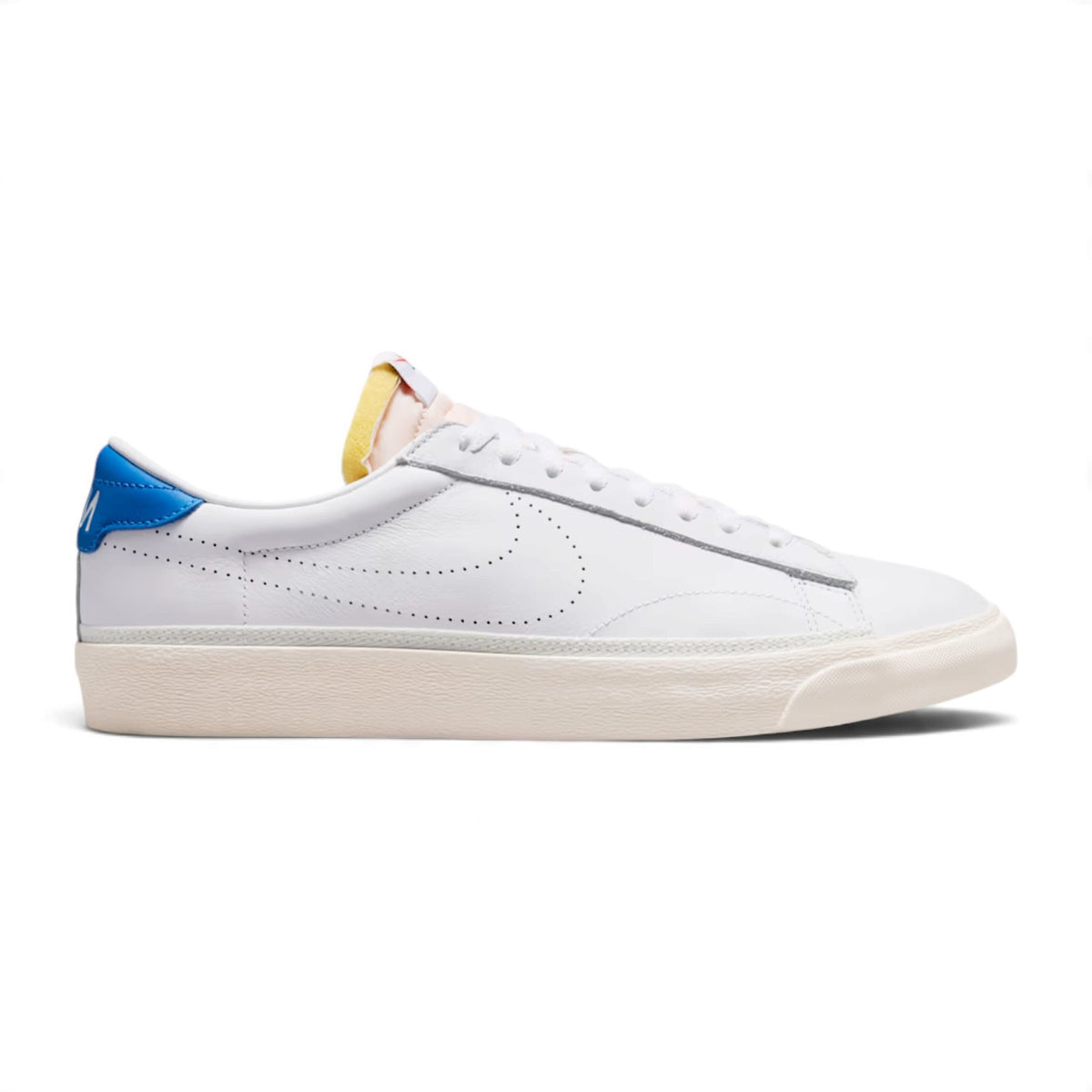 Side profile of the Nike Tennis Classic AC in White and Light Photo Blue showing full-grain leather upper, perforated Swoosh, and vulcanised rubber sole.