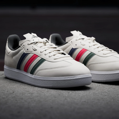 Angle View Showing Both Pair Side by Side: Emphasizing the classic Samba T-toe and the high-visibility stripes.