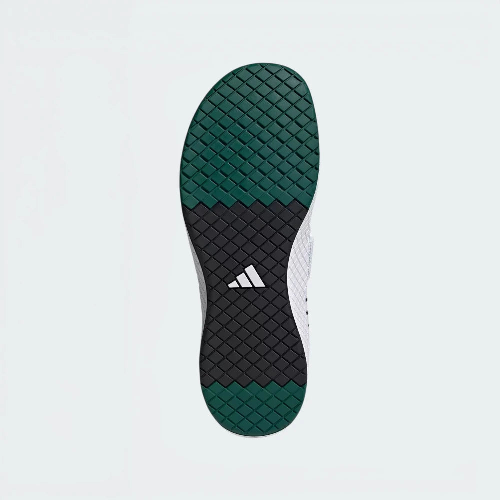 Displays the flat-profile geometric tread pattern of the high-traction rubber sole, engineered for unreal floor contact and a zero-slip platform plant.