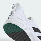 Highlights the "unreal" clean finish where the zero-raise rubber outsole compound securely bonds to the durable textile framework.