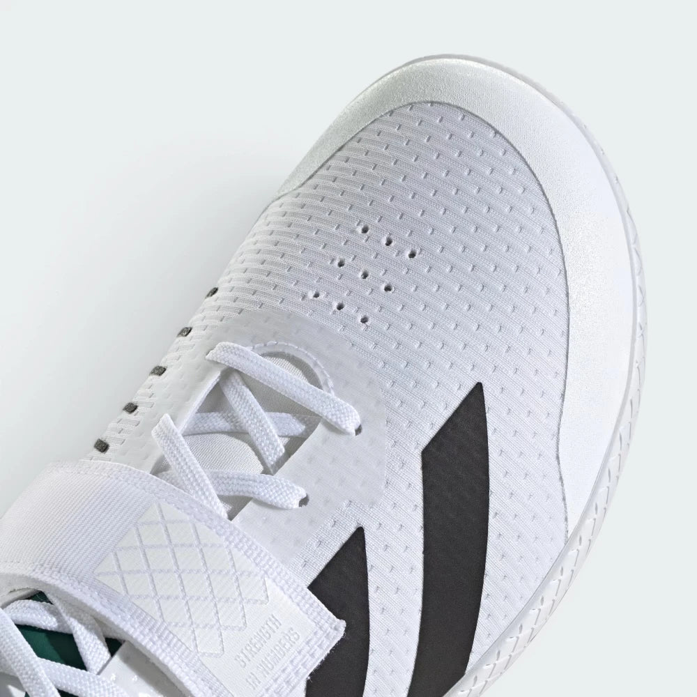 Details the premium stitching framing the reinforced wide toe box area and the high-tension tracking of the instep strap buckle layout.