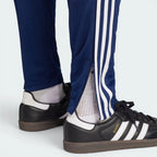 Focuses on the contoured shape of the lower leg panels, tailored cleanly to wrap the calves securely above your training cleats or running shoes.