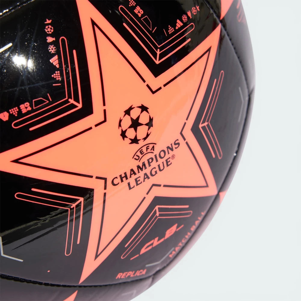 Zoom looking at the front of the ball and the printed UCL logo, highlighting the texture of the recycled TPU cover.