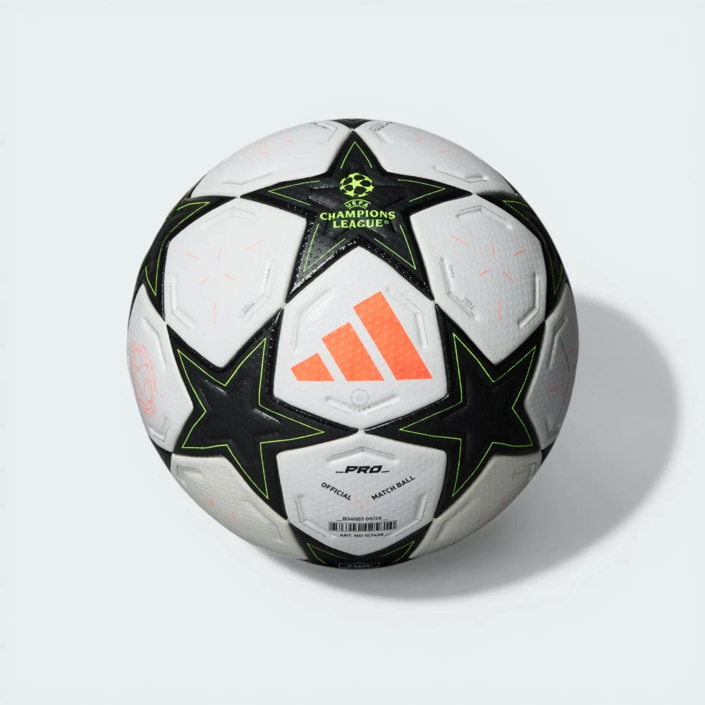 Side profile of the 24/25 UCL Pro ball, highlighting the iconic star panels and the Platinum Metallic accents.