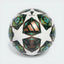 The UCL Pro Sala 24/25, highlighting the vibrant "Solar Slime" stars and the intricate Munich-inspired graphics.