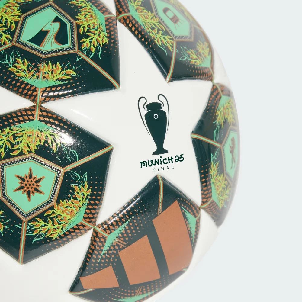Highlights a close-up section focusing on the tournament trophy emblem, displaying the sharp "MUNICH 25 FINAL" text script set against a pristine white backdrop, surrounded by detailed green architectural and foliage panel prints.