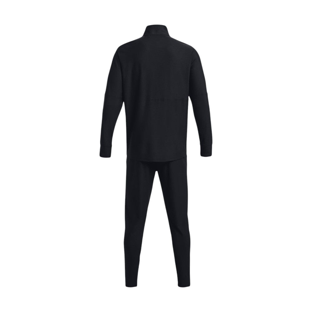 Highlights the clean rear profile of the matching black tracksuit, showcasing the seamless upper back panel across the shoulders, stand-up collar, and tapered trouser legs.