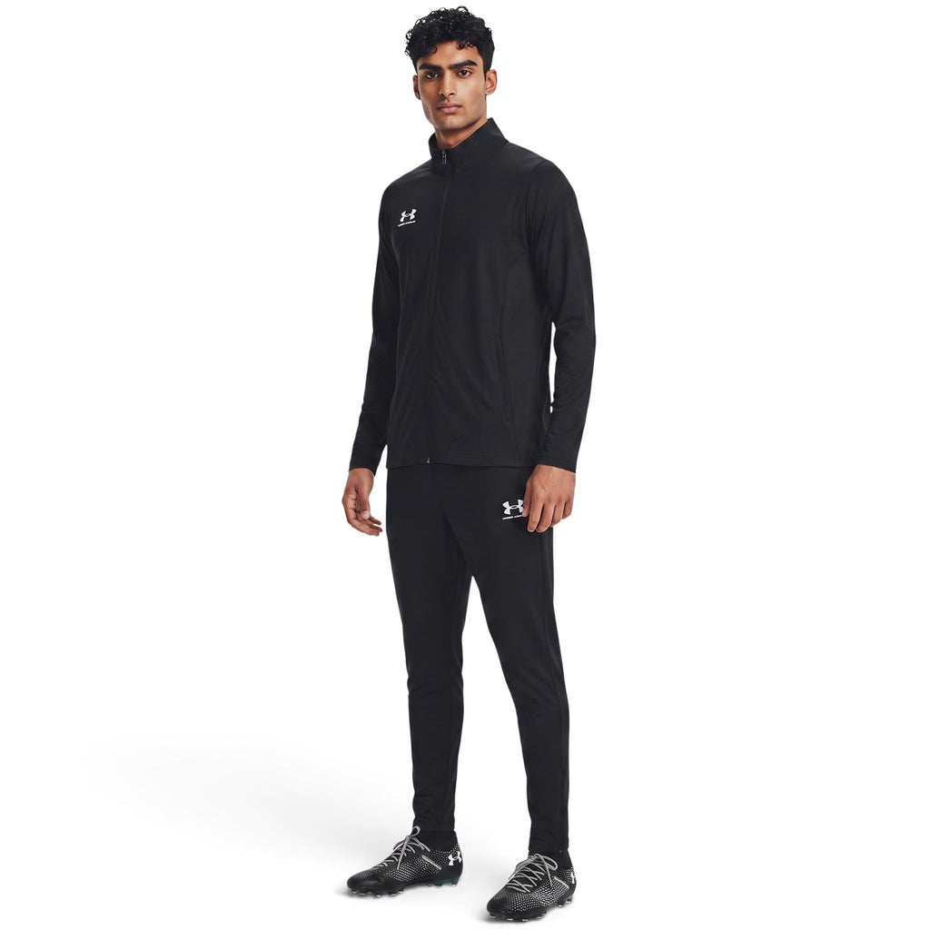 Displays the full-body front stance on the model, emphasising the relaxed yet tapered athletic cut through the legs and torso, crisp white chest and thigh branding, and functional collar coverage.