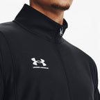 Highlights the upper jacket construction, showing the raised stand collar, durable metallic zip puller with UA logo, fine textured knit fabric weave, and the crisp white Under Armour logo print on the right chest.