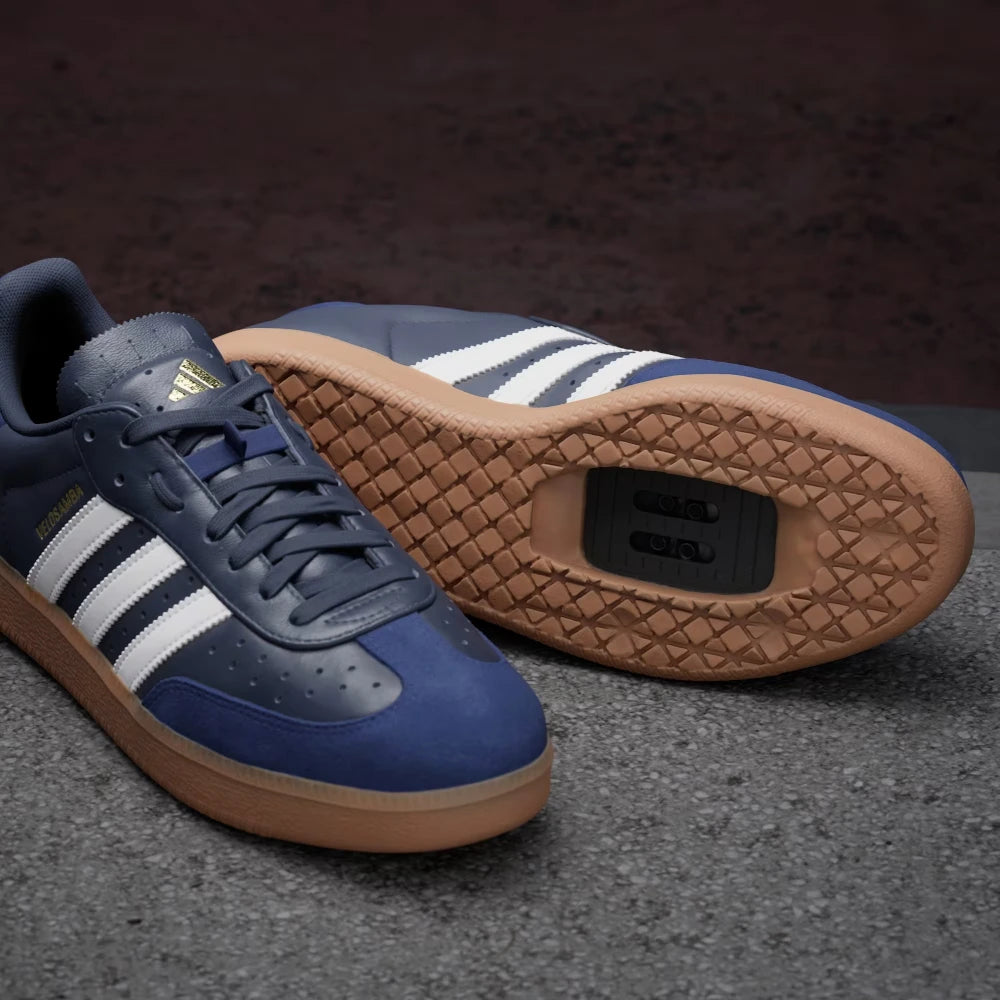 Highlights the "unreal" robust finish where the synthetic walk-pad walls bond securely to the full-grain leather upper around the cleat tracks.