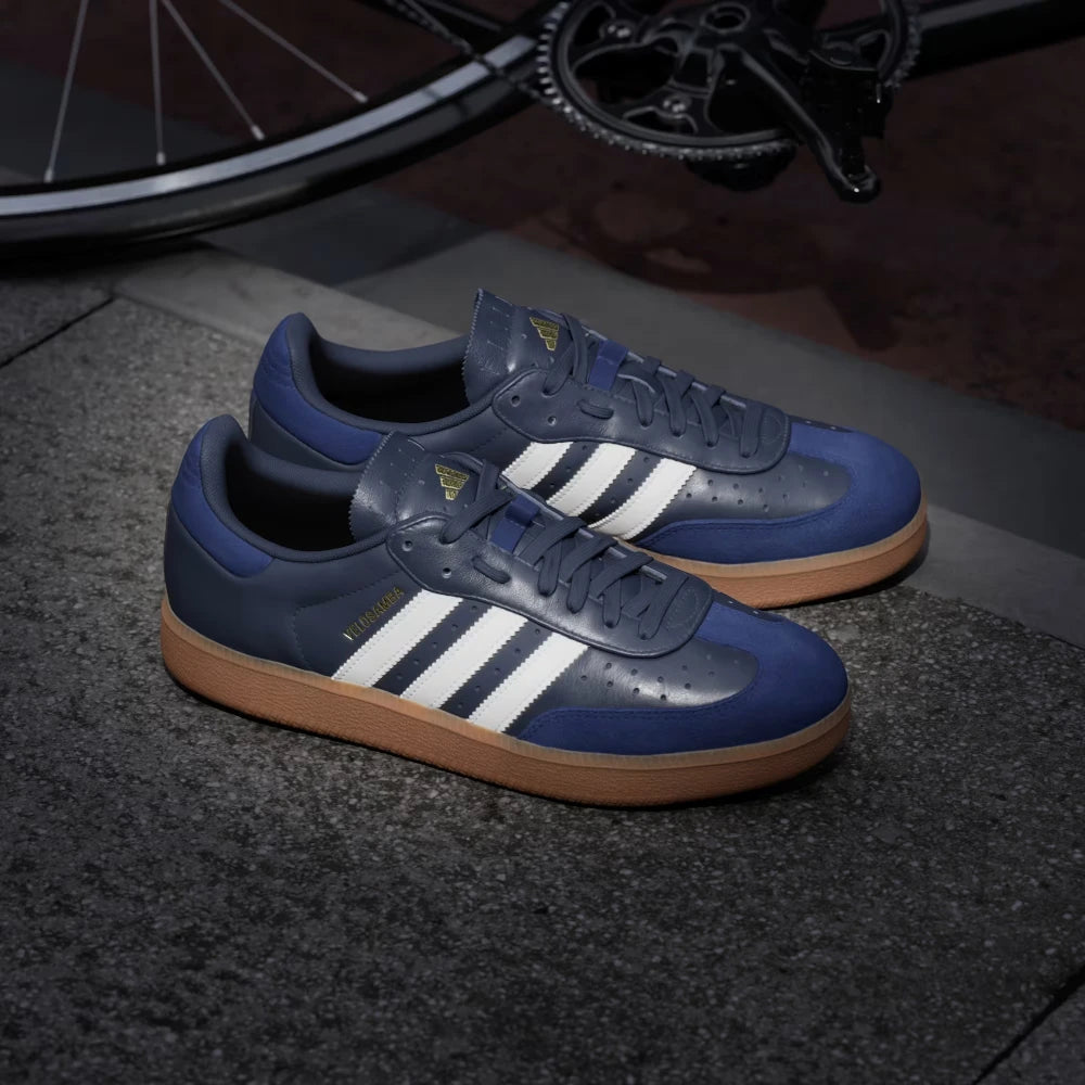 Emphasising how closely the structural profile mirrors a standard lifestyle Samba shoe while providing rigid cycling enhancements.