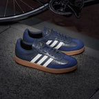 Emphasising how closely the structural profile mirrors a standard lifestyle Samba shoe while providing rigid cycling enhancements.