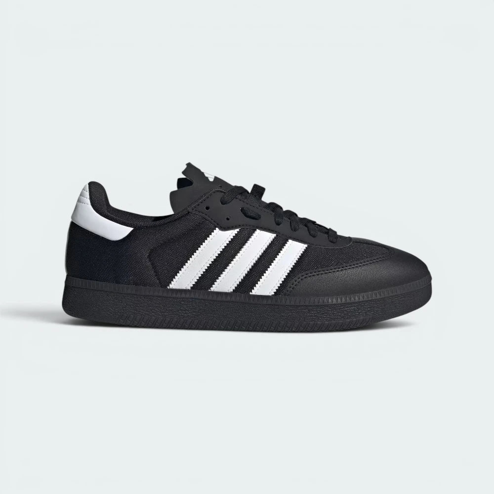 Highlights the high-velocity sweep of the reflective Cloud White 3-Stripes, showing the crisp canvas weave of the Core Black textile upper and the sleek integration of the low-profile cycling sole.