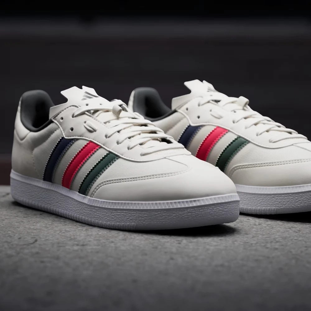 White sneakers with colorful stripes on a dark background