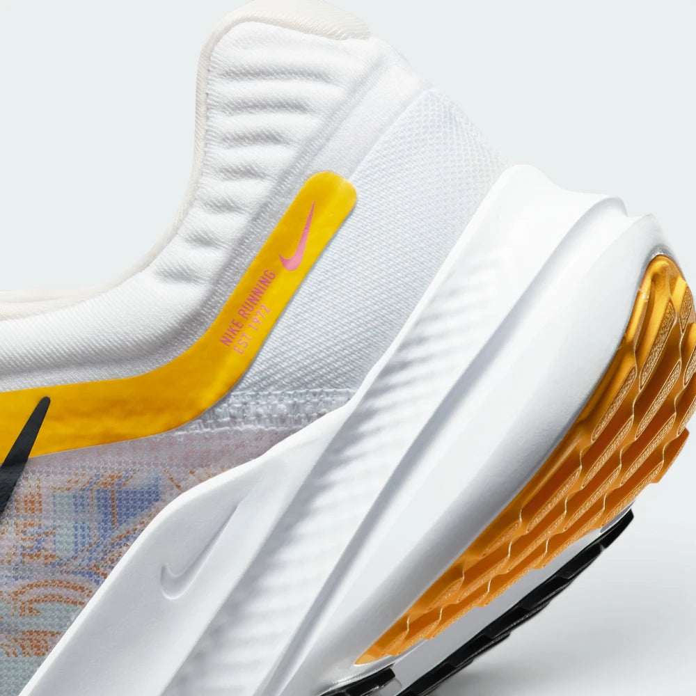 Highlights the "unreal" clean finish where the springy foam cushioning carrier meets the high-traction road rubber base.