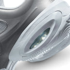 Highlights the "unreal" clean finish where the sculpted white foam midsole carrier encloses the oval Max Air window, framing the organic ripple pattern of the rubber tread.