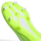 Close-up of a neon green soccer cleat with white studs on a light gray background