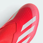 Details the high-definition micro-textures on the laceless strike zone and the clean finish of the toe box.