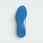 Displays the technical lug rubber outsole layout engineered for unreal multi-directional traction on artificial turf.