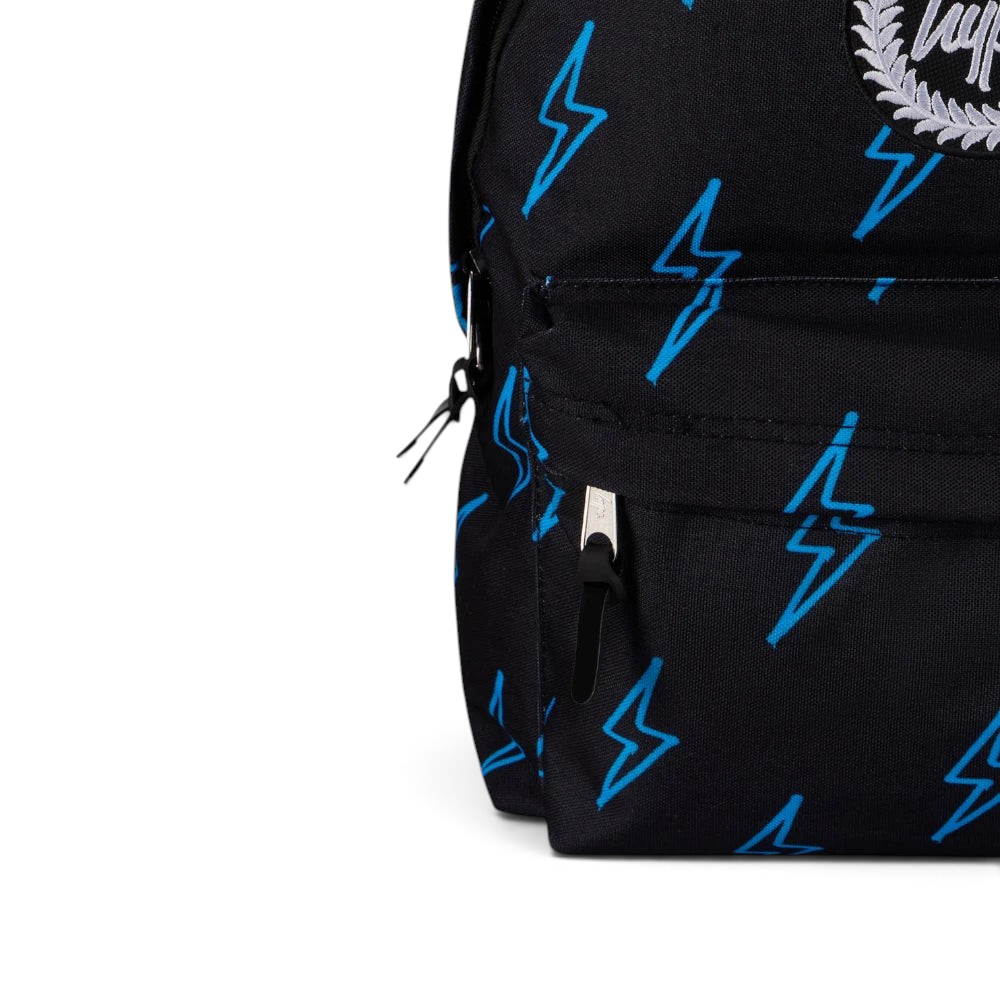 Details the high-definition embroidery and the precision of the front pocket zip.