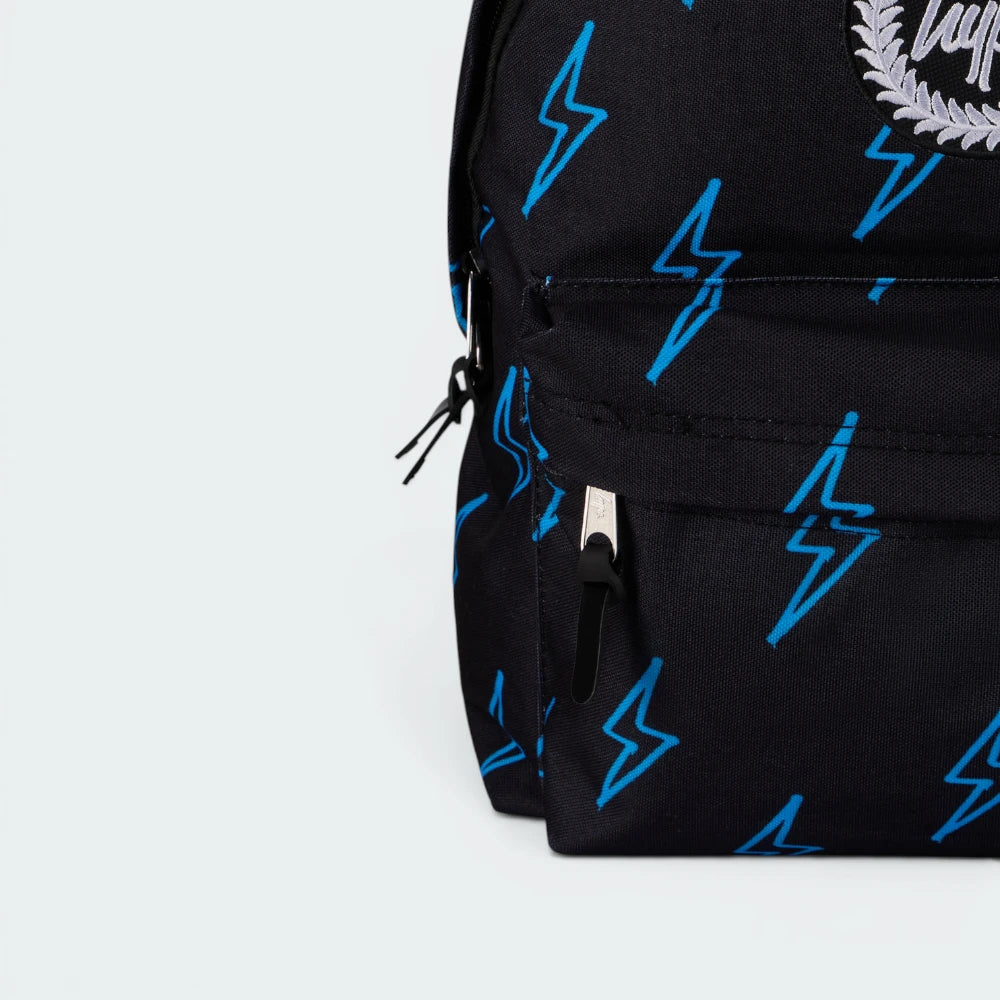 Details the high-definition embroidery and the precision of the front pocket zip.