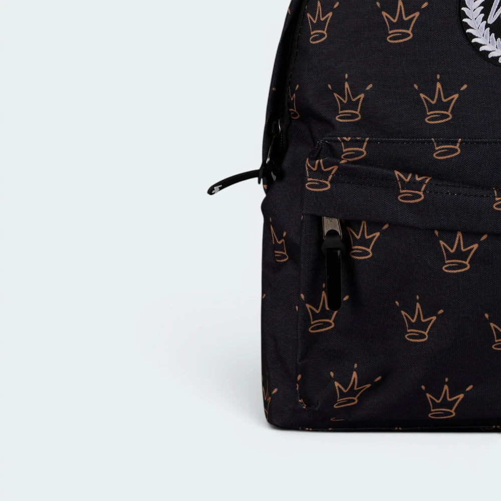 Details the high-definition embroidery and the precision of the front pocket zip.