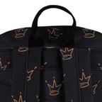Focuses on the padded back panel and the professional webbing grab handle.
