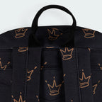 Focuses on the padded back panel and the professional webbing grab handle.