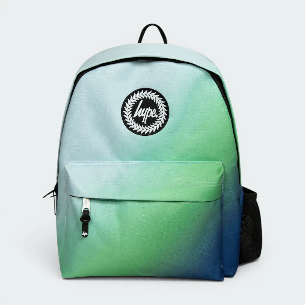 Focuses on the locked-in zip closure and the professional embroidered HYPE. crest against the gradient fade.