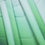 Focuses on the padded back panel and the professional webbing grab handle.