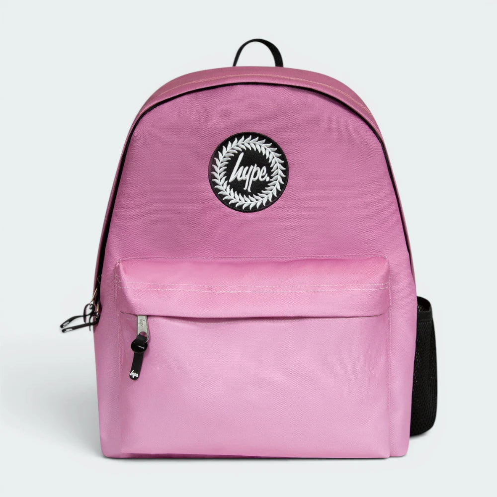Focuses on the locked-in zip closure and the professional embroidered HYPE. crest against the muted fade.