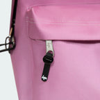 Featuring the front pocket with branded zipper
