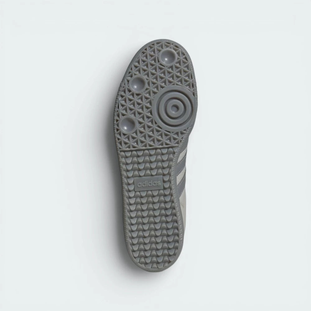 View of the rubber outsole, detailing the classic pivot-point traction pattern in a matching grey finish.