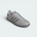 Three-quarter angle of the pair, emphasizing the sleek, streamlined design and the premium leather texture.