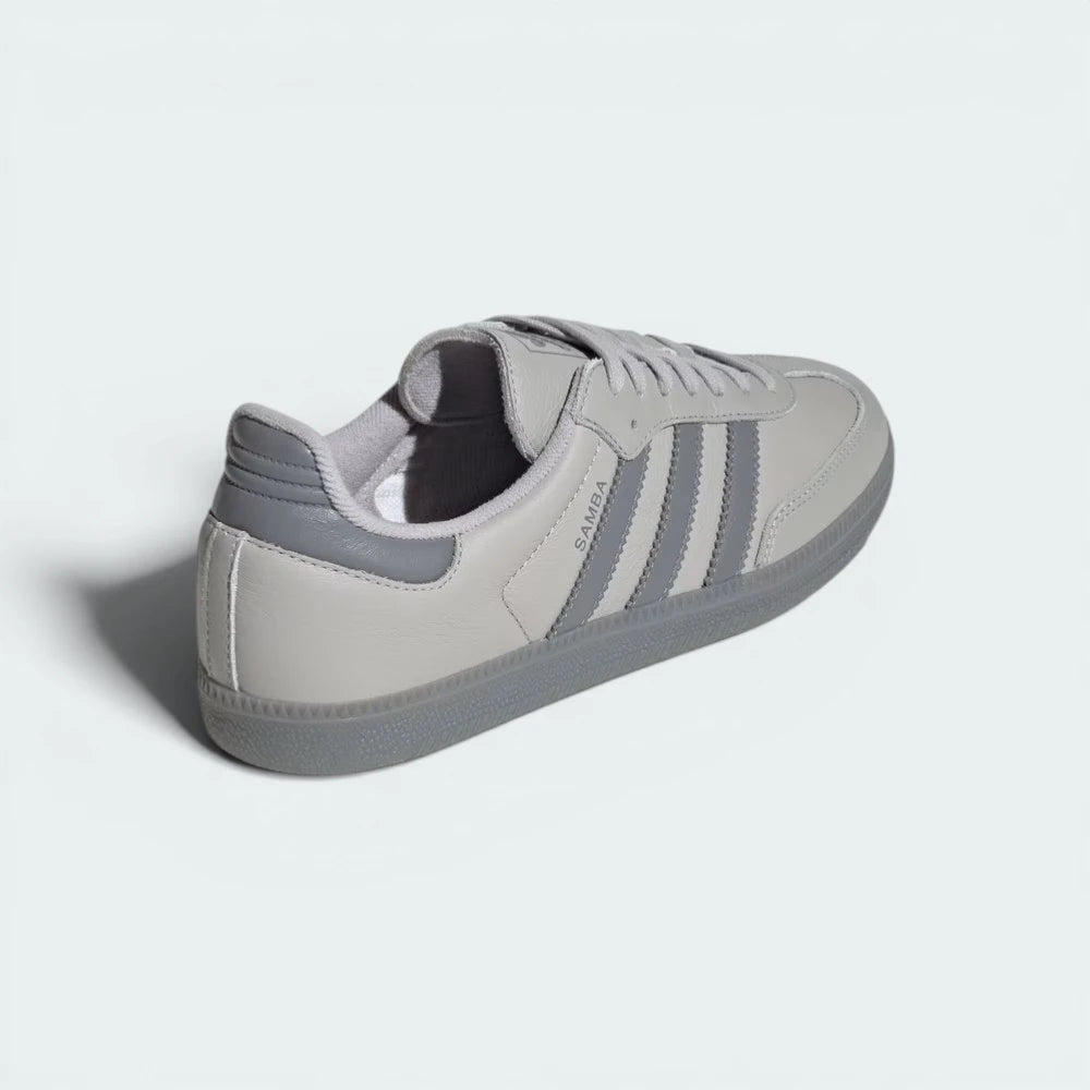 Rear view of the shoes, focusing on the structured heel and the low-cut athletic collar.