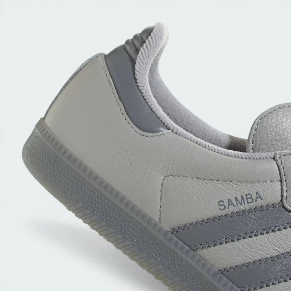 Close-up of the forefoot area, highlighting the precision stitching and the contrast between the leather and suede materials.